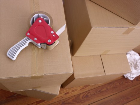Removalists handling large furniture