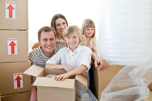 Professional movers securing items in a moving truck